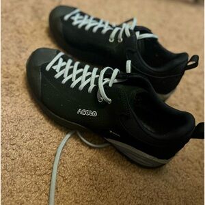 Black Asolo women’s hiking shoes.